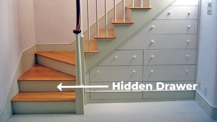 Hidden drawer under the stairs