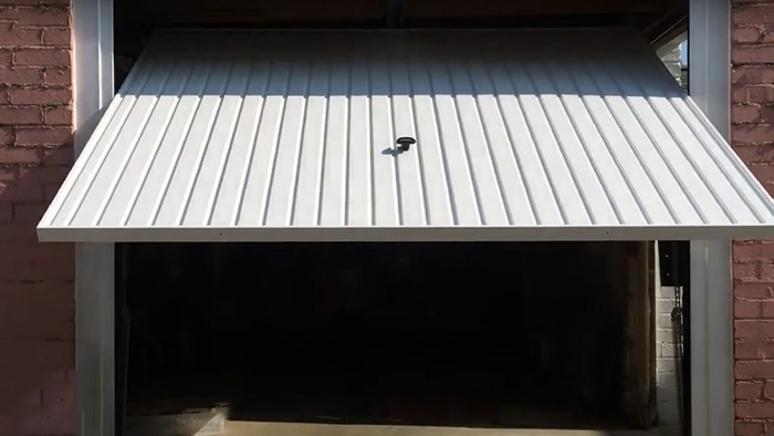 Canopy tilt up garage door