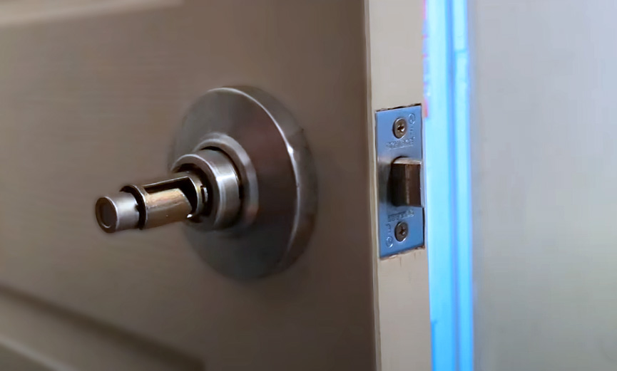 Locking bedroom door by removing the handle